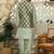 Silk blend solid olive kurta and churidar with green printed nehru jacket
