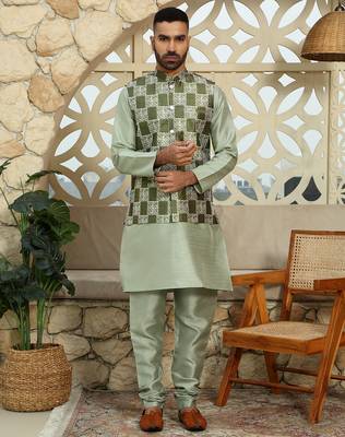 Silk blend solid olive kurta and churidar with green printed nehru jacket 5