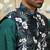 Silk blend solid green kurta and churidar with floral nehru jacket