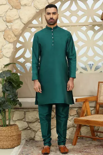 Silk blend solid green kurta and churidar with floral nehru jacket