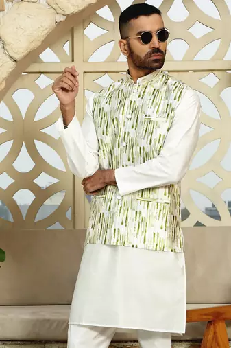 Silk blend solid cream kurta and churidar with tie-dye green nehru jacket