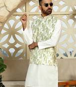 Silk blend solid cream kurta and churidar with tie-dye green nehru jacket