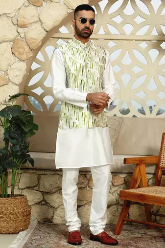 Silk blend solid cream kurta and churidar with tie-dye green nehru jacket