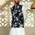 Silk blend solid cream kurta and churidar with floral green nehru jacket