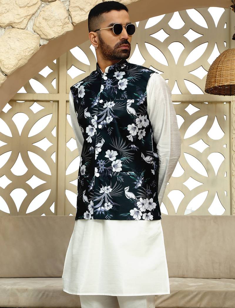 Silk blend solid cream kurta and churidar with floral green nehru jacket