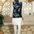 Silk blend solid cream kurta and churidar with floral green nehru jacket