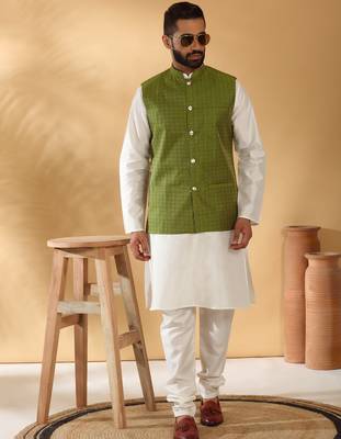 Silk blend cream kurta and churidar with jacquard geometric green nehru jacket 1