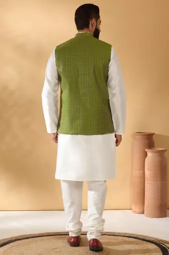 Silk blend cream kurta and churidar with jacquard geometric green nehru jacket