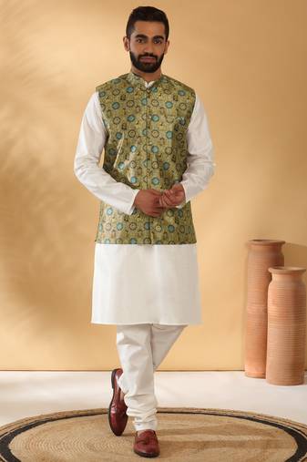 Silk bleand cream kurta churidar with abstract printed green nehru jacket