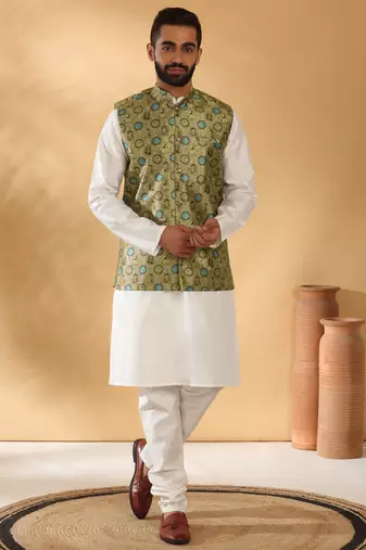 Silk bleand cream kurta churidar with abstract printed green nehru jacket