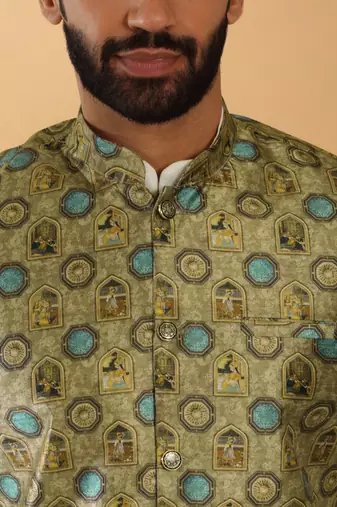 Silk bleand cream kurta churidar with abstract printed green nehru jacket