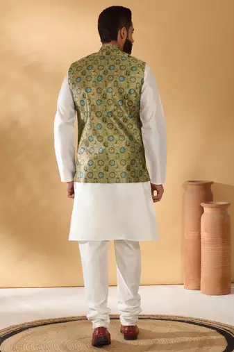 Silk bleand cream kurta churidar with abstract printed green nehru jacket