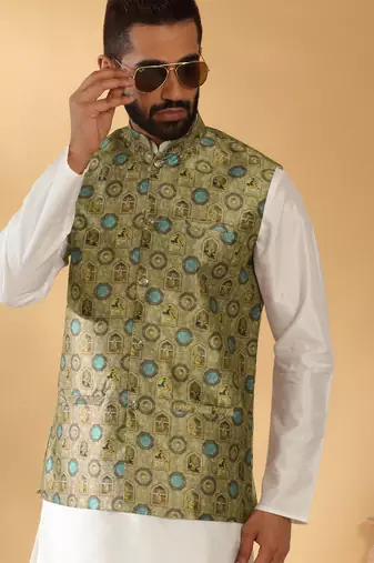 Silk bleand cream kurta churidar with abstract printed green nehru jacket