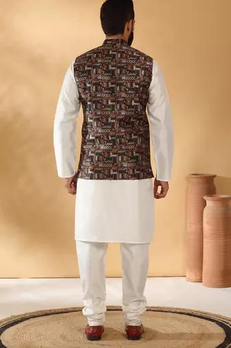Silk bleand cream kurta churidar with abstract printed black nehru jacket