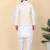 Men silk blend cream kurta and churidar with embroidered beige nehru jacket