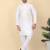 Men silk blend cream kurta and churidar with embroidered beige nehru jacket