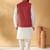 Silk blend cream kurta and churidar with jacquard geometric maroon nehru jacket