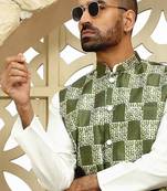 Silk blend solid cream kurta and churidar with green printed nehru jacket