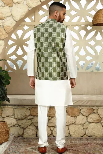 Silk blend solid cream kurta and churidar with green printed nehru jacket