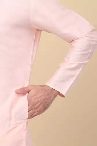 Men silk blend peach kurta and churidar with embroidered nehru jacket