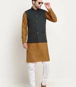Cotton gold tonned kurta and pyjama with green nehru jacket