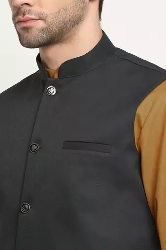 Cotton gold tonned kurta and pyjama with green nehru jacket