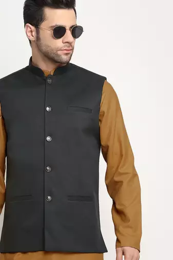 Cotton gold tonned kurta and pyjama with green nehru jacket
