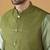 Silk blend olive green kurta and churidar with jacquard geometric green nehru jacket