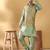 Silk bleand olive green kurta churidar with abstract printed green nehru jacket