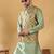 Silk bleand olive green kurta churidar with abstract printed green nehru jacket