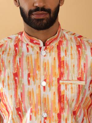 Silk blend cream kurta and churidar with tie-dye orange nehru jacket 3
