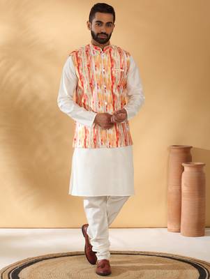 Silk blend cream kurta and churidar with tie-dye orange nehru jacket 5