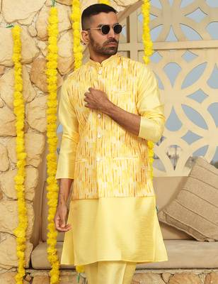 Silk blend solid yellow kurta and churidar with tie-dye yellow nehru jacket 1