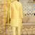 Silk blend solid yellow kurta and churidar with tie-dye yellow nehru jacket