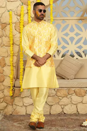 Silk blend solid yellow kurta and churidar with tie-dye yellow nehru jacket