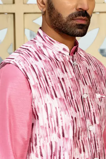 Silk blend solid pink kurta and churidar with tie-dye wine nehru jacket