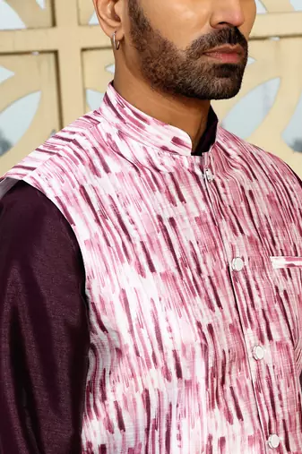 Silk blend solid purple kurta and churidar with tie-dye wine nehru jacket
