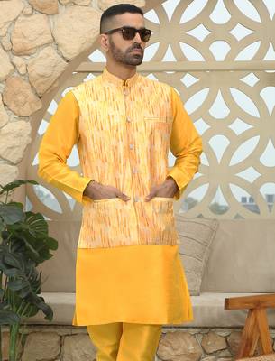 Silk blend solid yellow kurta and churidar with tie-dye yellow nehru jacket 1