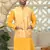 Silk blend solid yellow kurta and churidar with tie-dye yellow nehru jacket