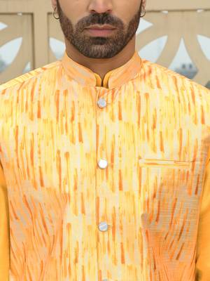 Silk blend solid yellow kurta and churidar with tie-dye yellow nehru jacket 2