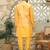Silk blend solid yellow kurta and churidar with tie-dye yellow nehru jacket