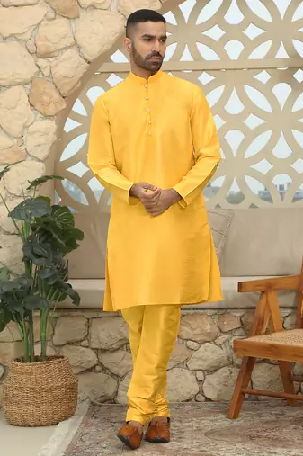 Silk blend solid yellow kurta and churidar with tie-dye yellow nehru jacket