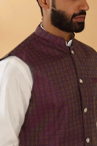 Silk blend cream kurta and churidar with jacquard geometric purple nehru jacket