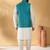 Silk blend cream kurta and churidar with jacquard geometric turquoise nehru jacket