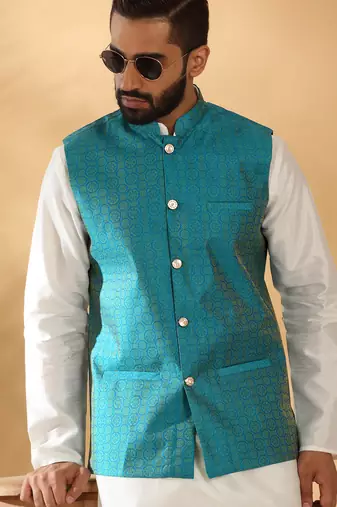 Silk blend cream kurta and churidar with jacquard geometric turquoise nehru jacket