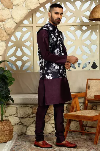 Silk blend solid Wine kurta and churidar with floral wine nehru jacket