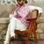 Silk blend solid cream kurta and churidar with tie-dye wine nehru jacket