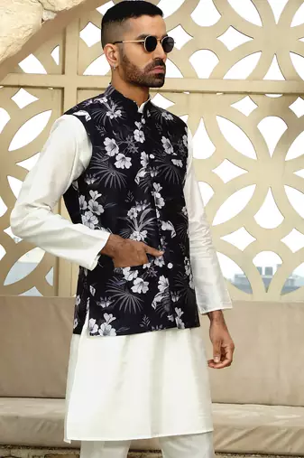 Silk blend solid cream kurta and churidar with floral wine nehru jacket