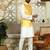 Silk blend solid cream kurta and churidar with tie-dye yellow nehru jacket