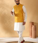 Silk blend cream kurta and churidar with jacquard geometric mustard nehru jacket